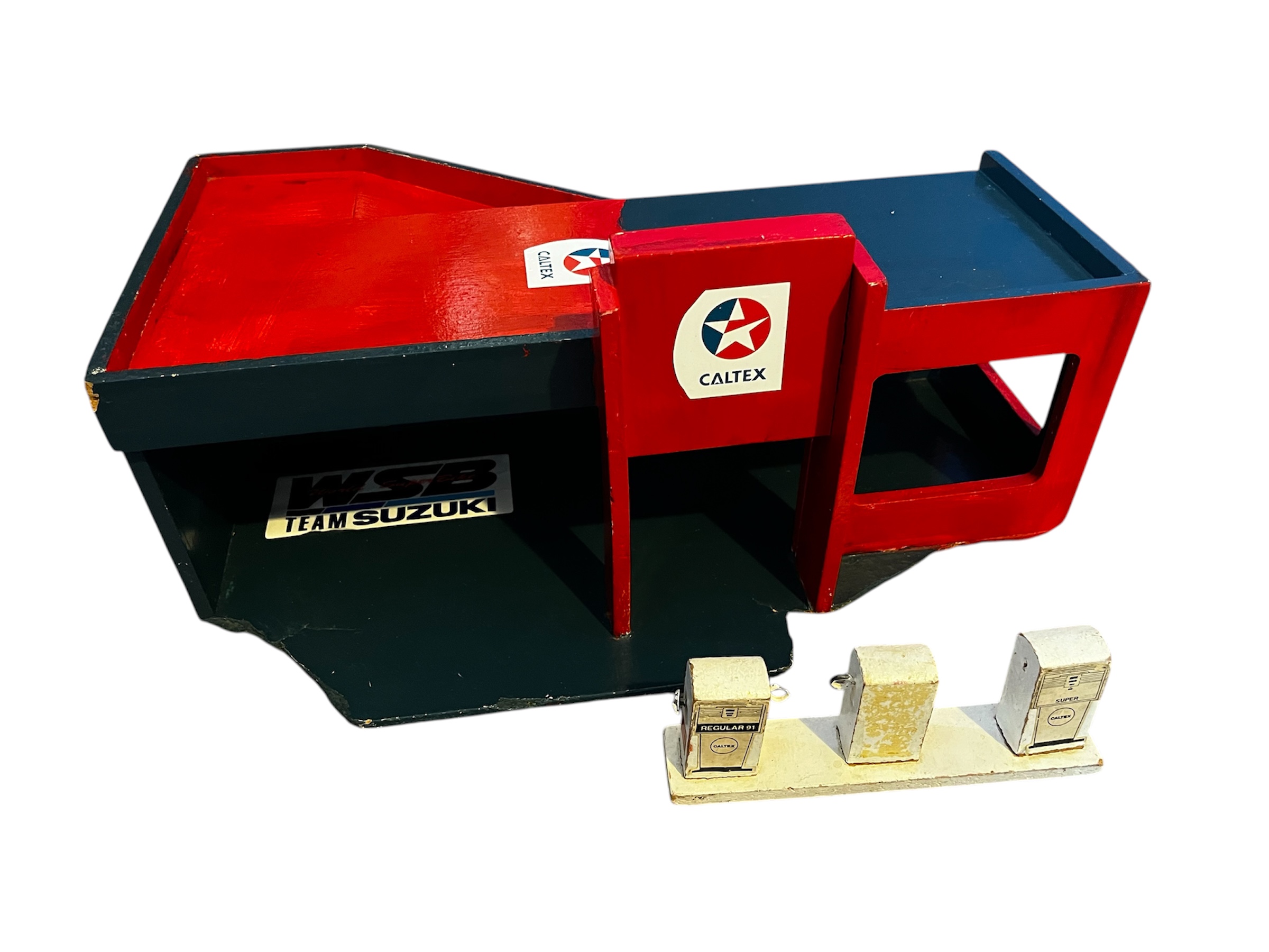 Wooden caltex fuel station and bowsers